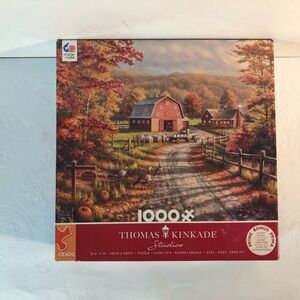 Thomas Kinkade Autumn Farm Puzzle with Red and Orange Hues